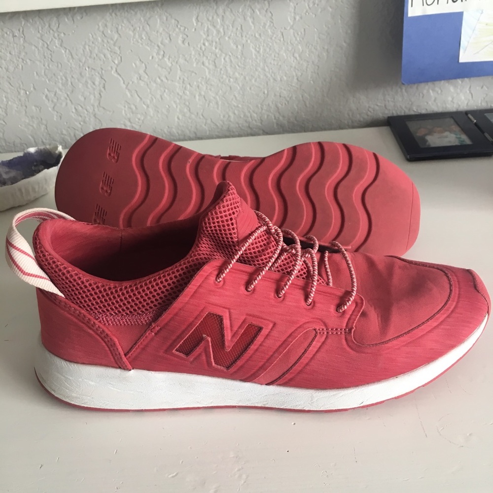 Red New Balance slip on sneakers